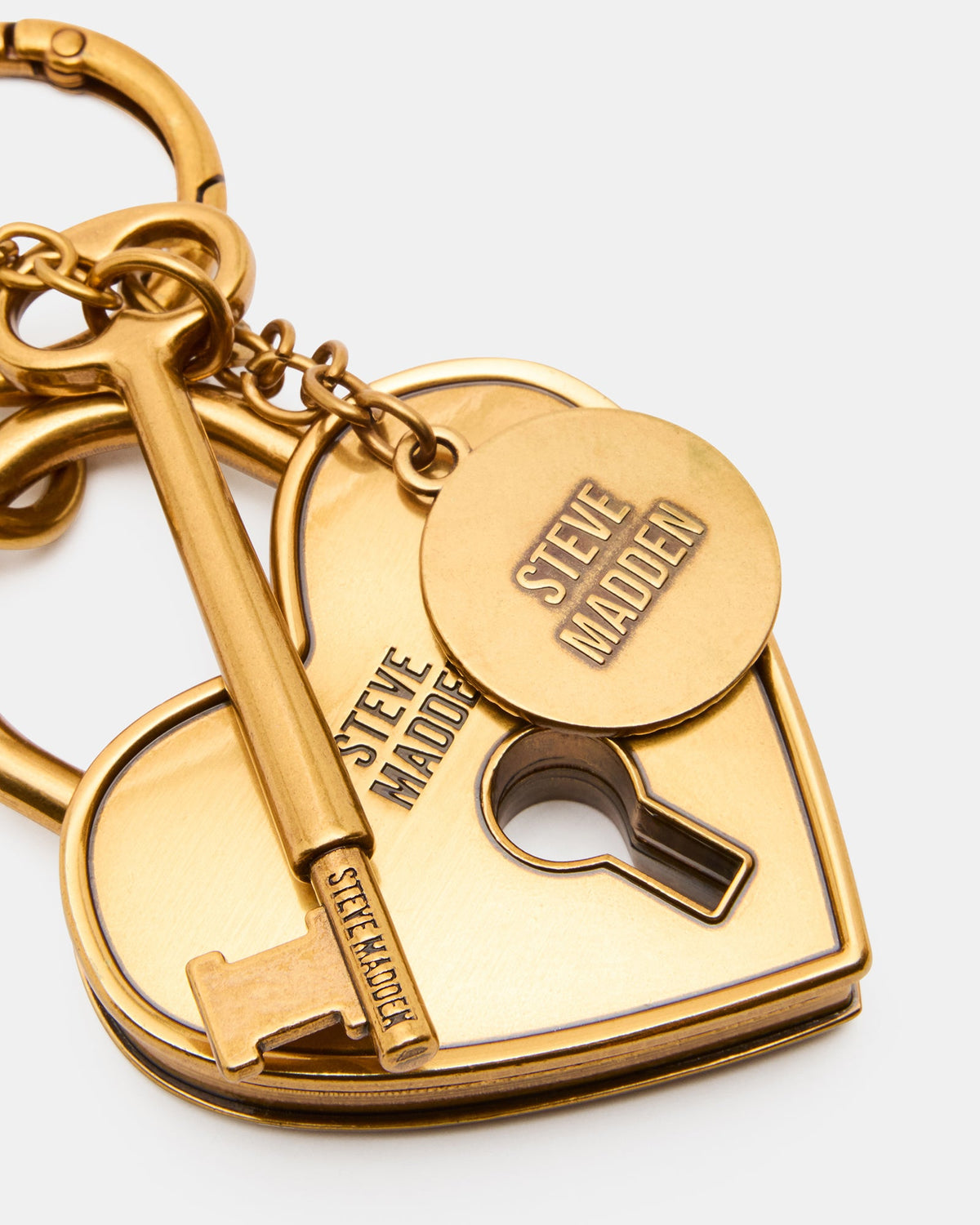 LOCKE BAG CHARM GOLD  Famous | Online Store