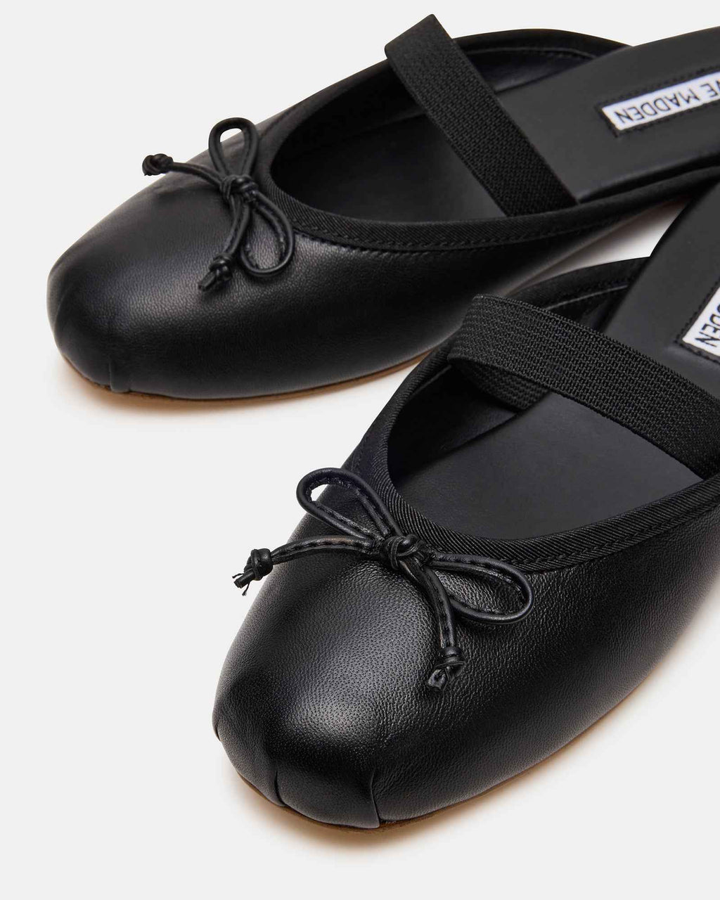CUTESY BLACK LEATHER