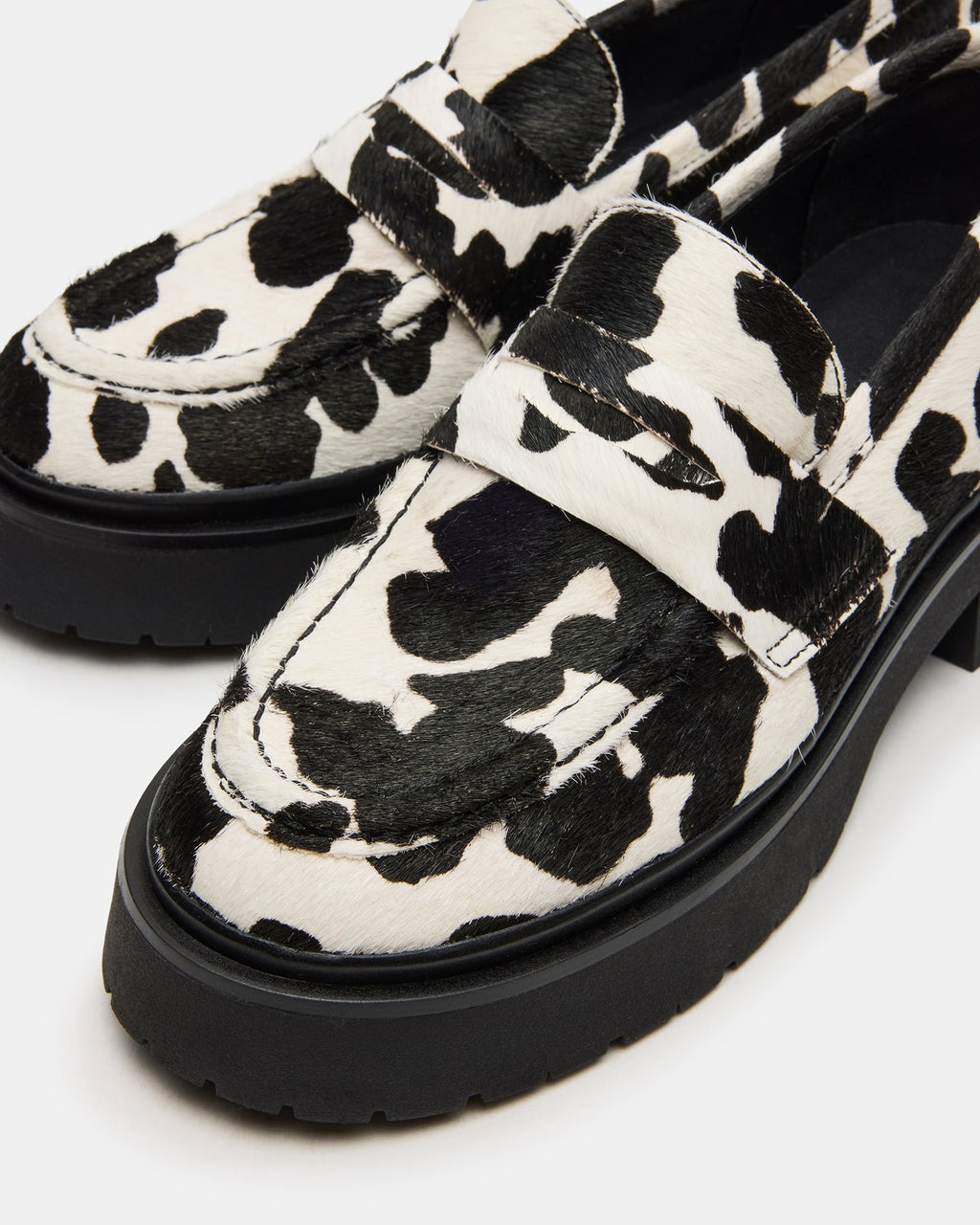 LAYKEN BLACK COW PRINT  Famous | Online Store